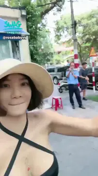 Flashing her boobs to the guy filming her